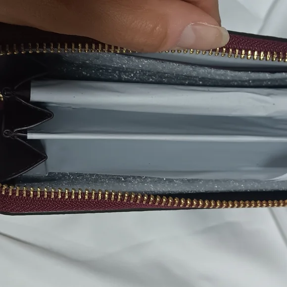 Coach Burgundy Wristlet with Floral Accents - Picture 5 of 7